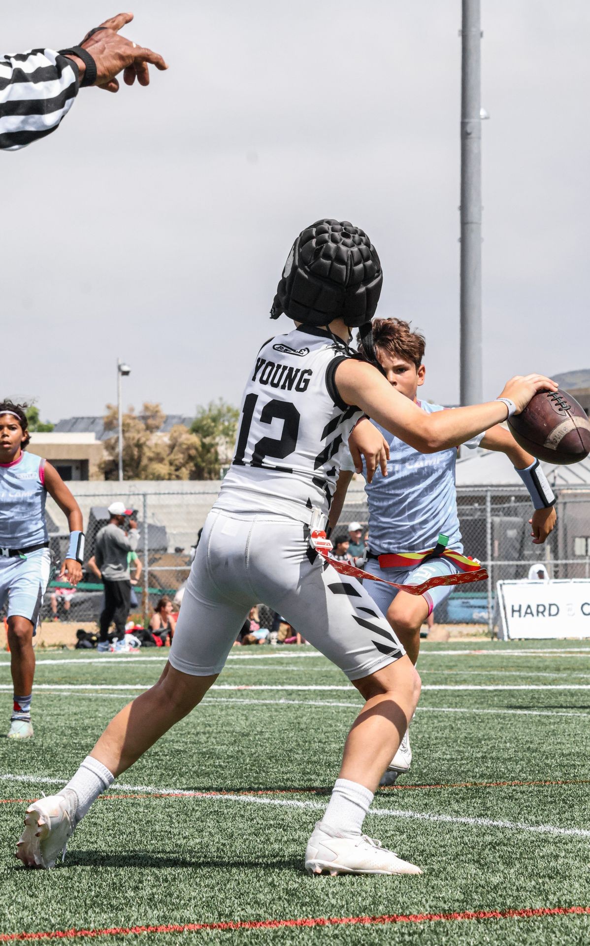 An Apex Predators boys flag football team in action.